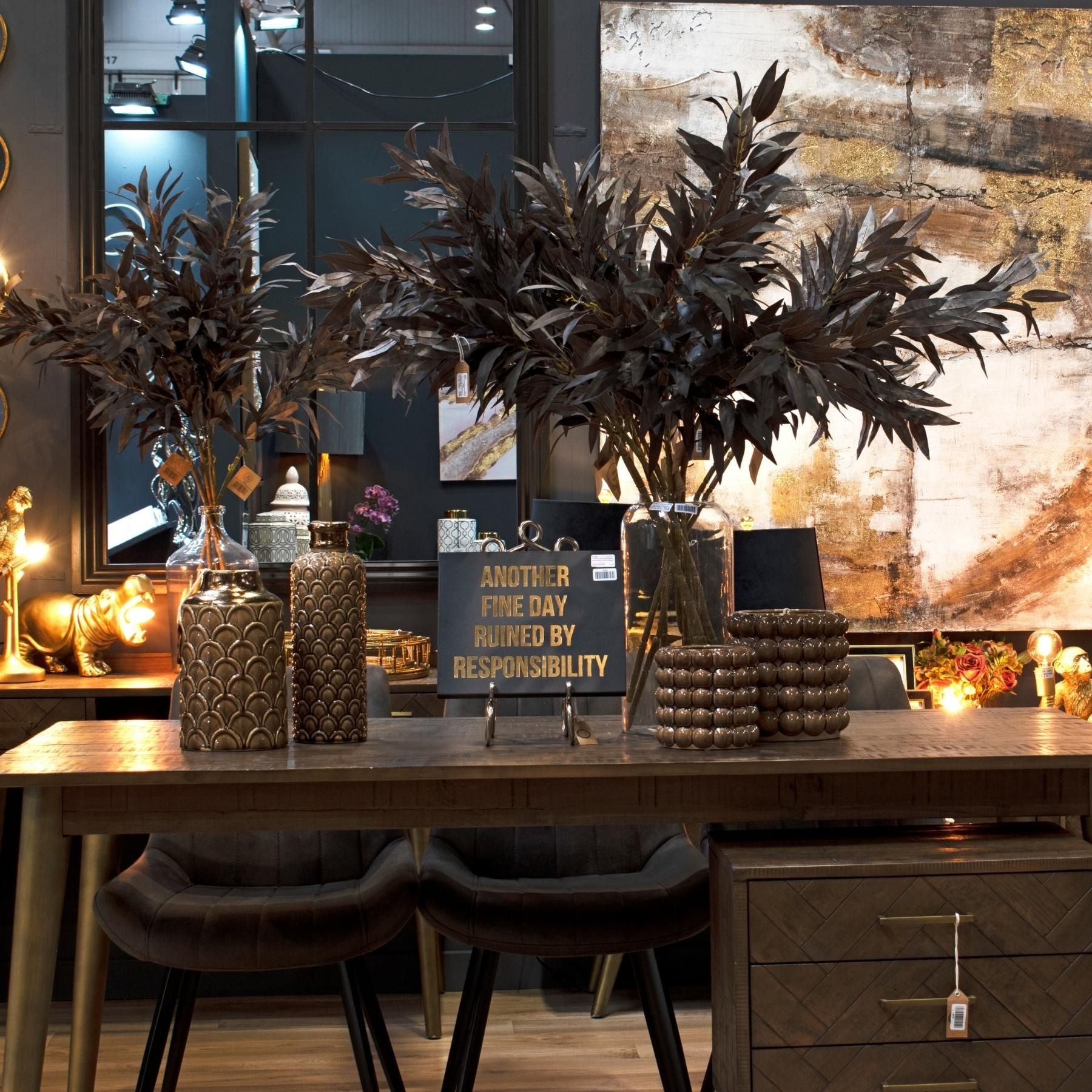 Burwell Caramel Bubble Planter styled on a console surface in natural light, showcasing its raised bubble texture and warm caramel glaze as a sculptural accent in a neutral interior.