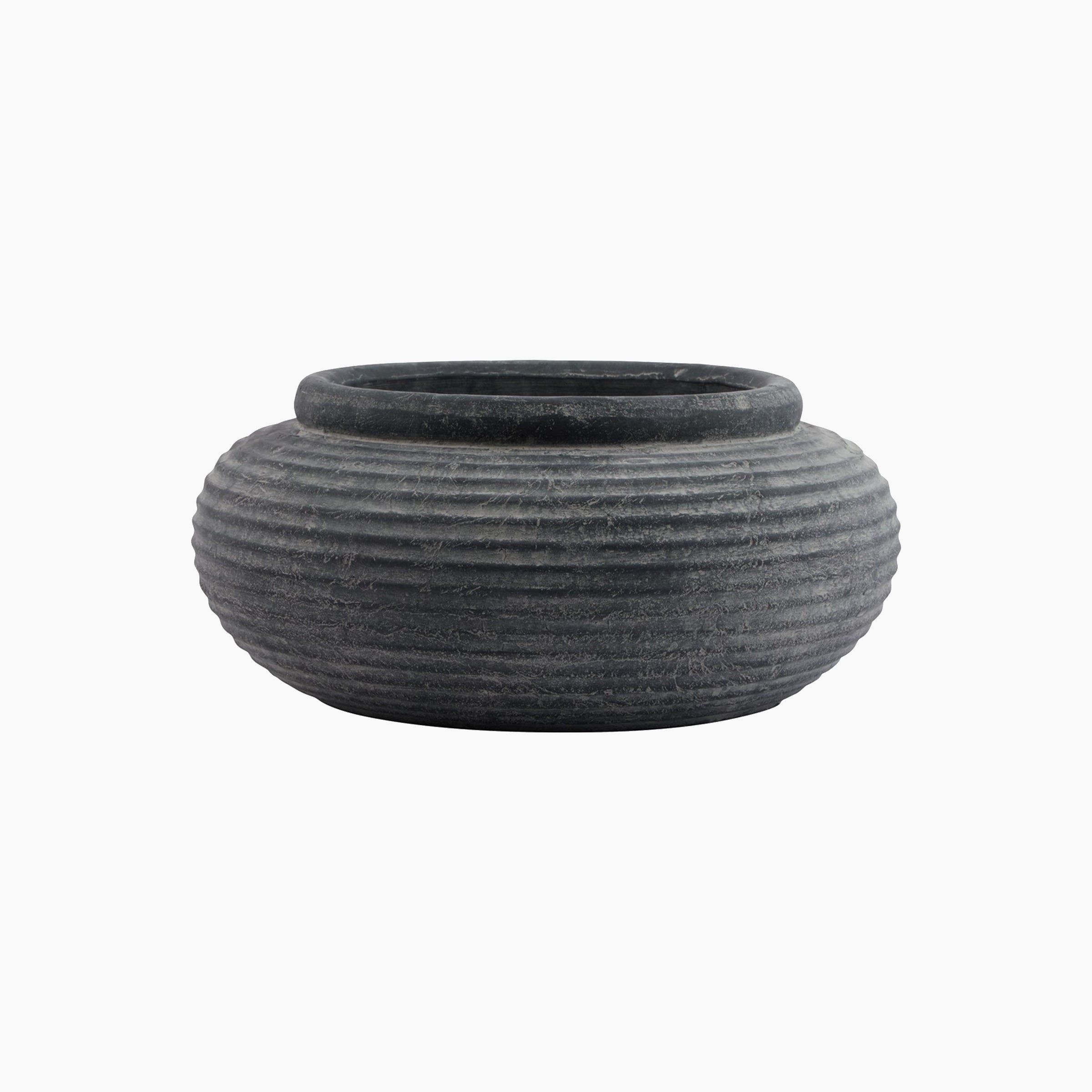 Front view of the Ashbury Ribbed Stoneware Bowl Planter in slate black, showing its low, wide profile and vertically ribbed ceramic surface with matte finish.