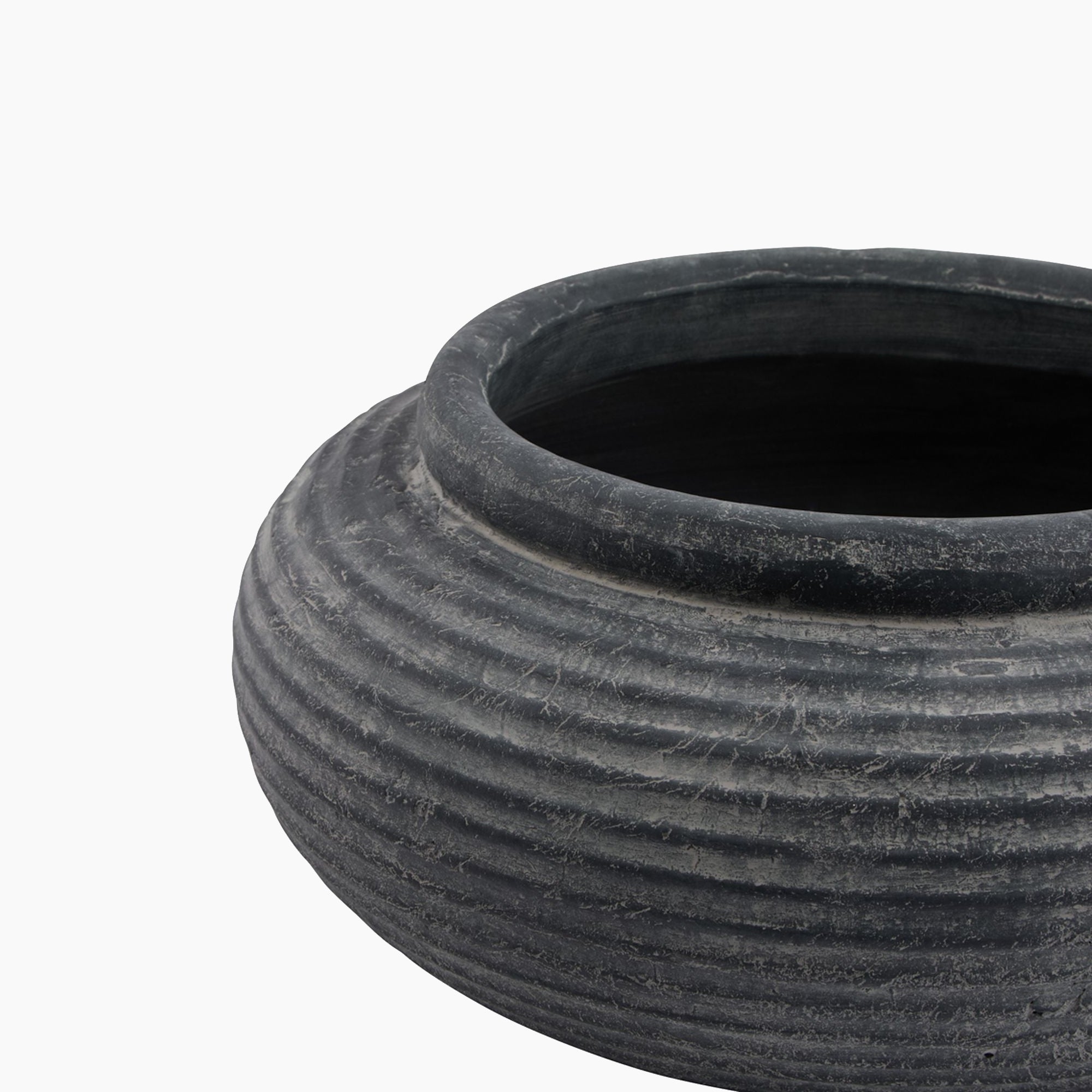 Top-down view of the Ashbury Ribbed Stoneware Bowl Planter, revealing its wide circular opening and shallow interior suited for faux florals or moss arrangements.