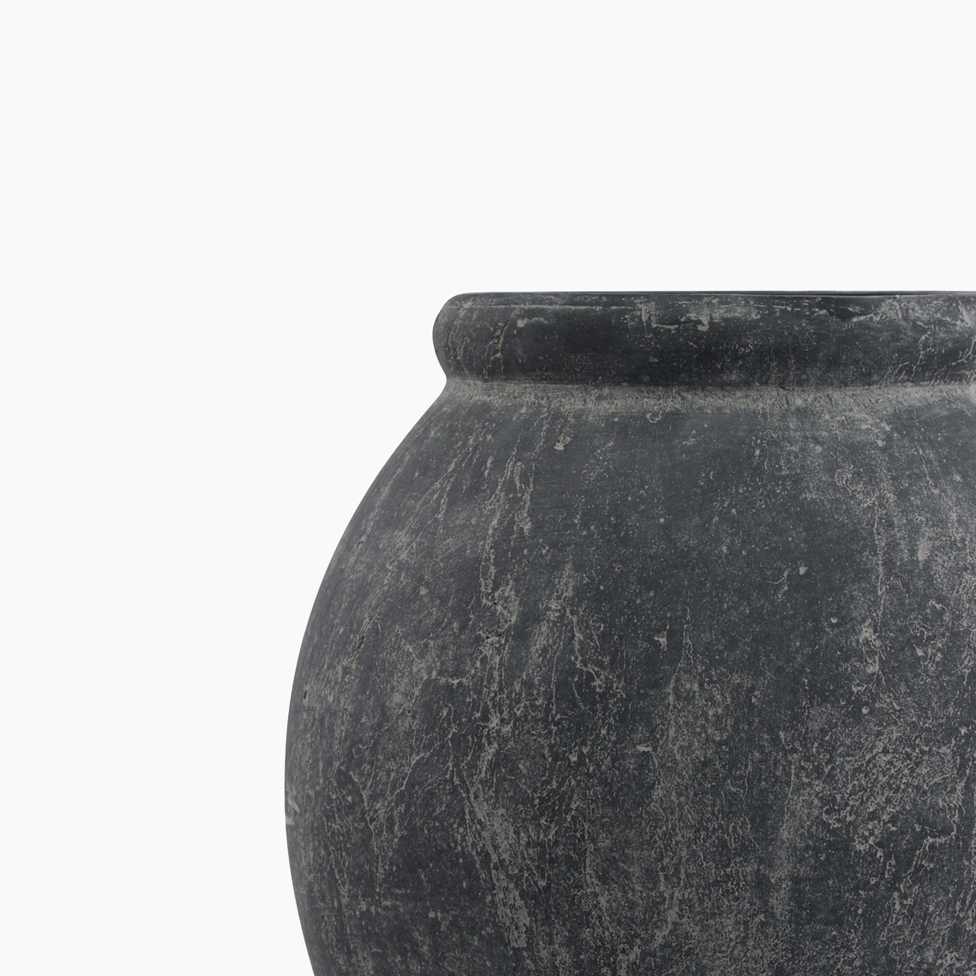 Side profile of the Ashbury Slate Ash Jar Planter showing its sculptural silhouette and curved body tapering into a slim neck, with slate-toned glaze detailing.