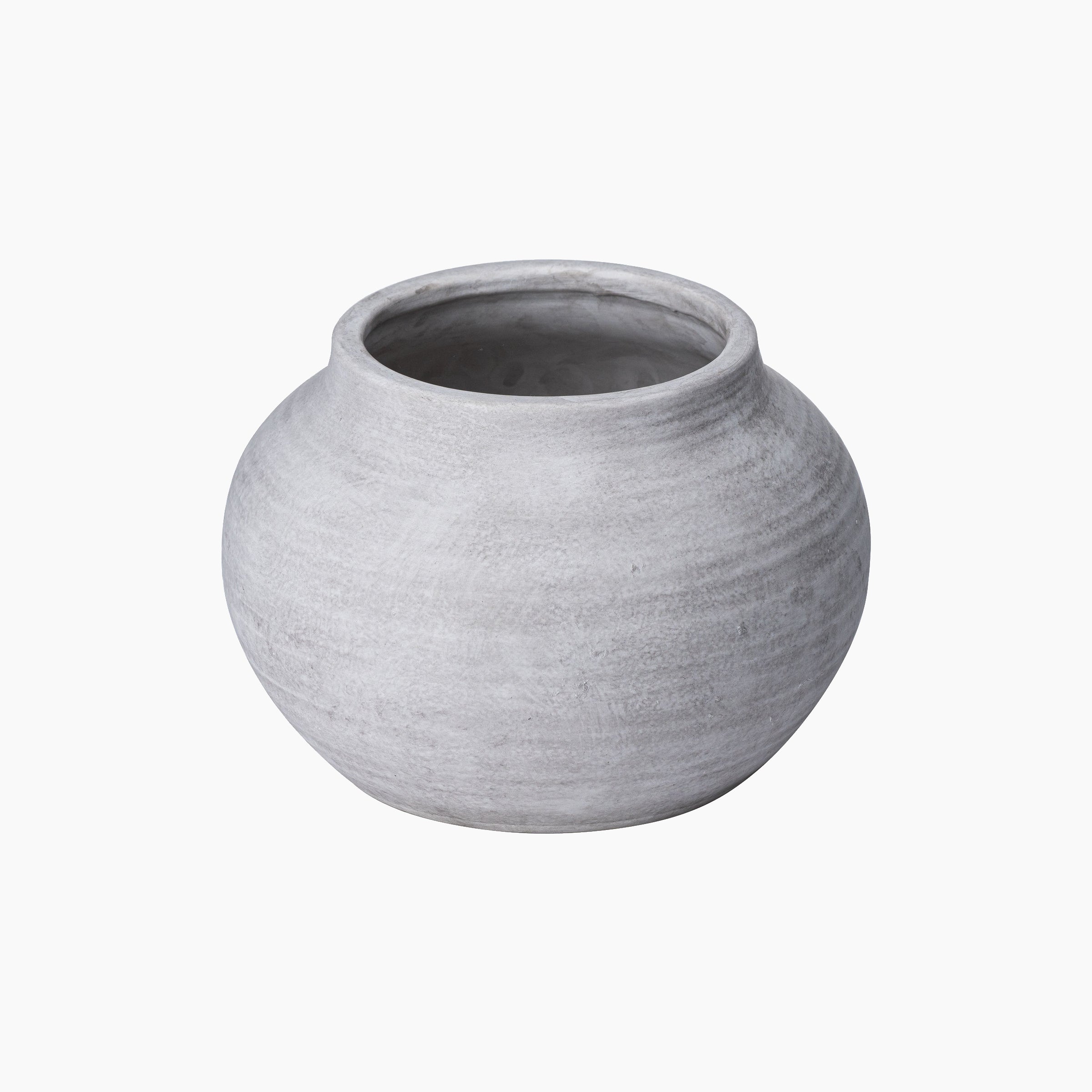 Studio photograph showing the Bramley Stoneware Planter front-on, with a rounded stone-like silhouette and softly weathered ceramic texture in pale taupe-grey.