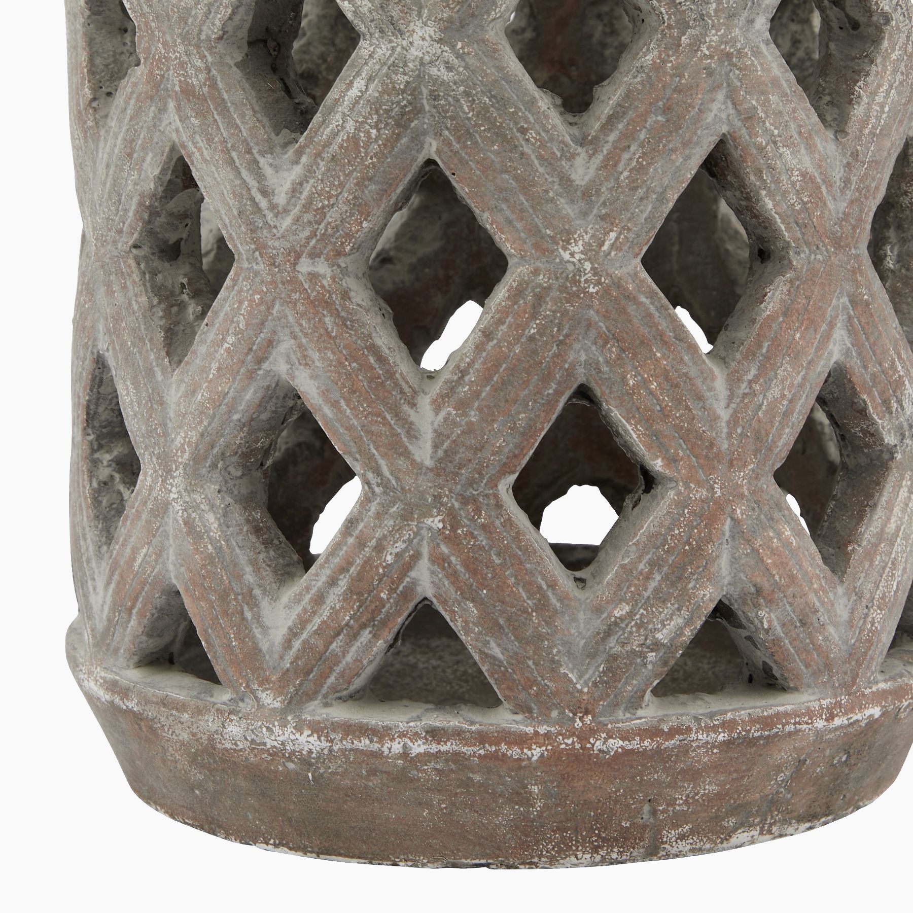 Side profile of large stone lattice lantern highlighting metal carry handle and intricate diamond lattice pattern