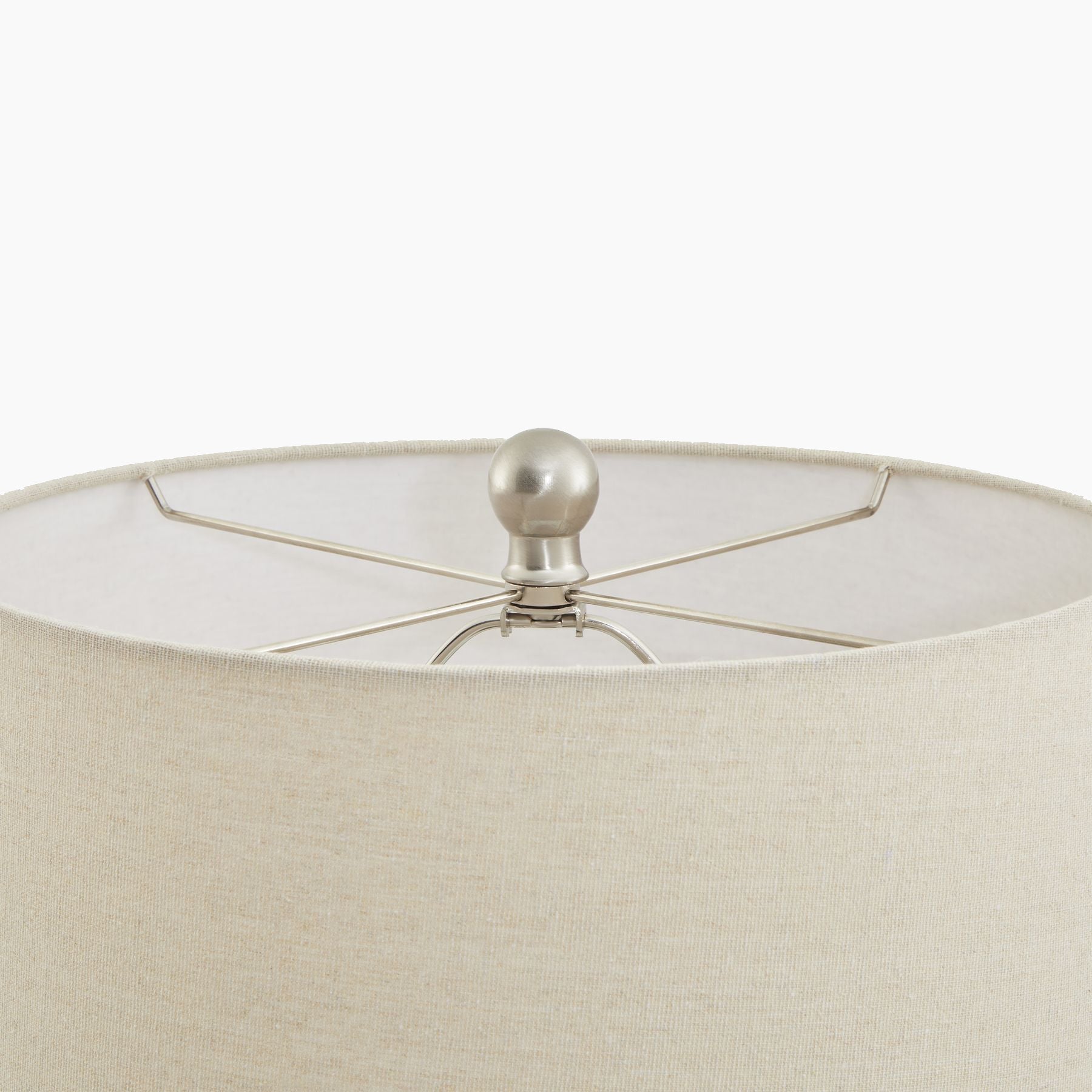 Top-down view of table lamp showing circular linen shade and compact footprint