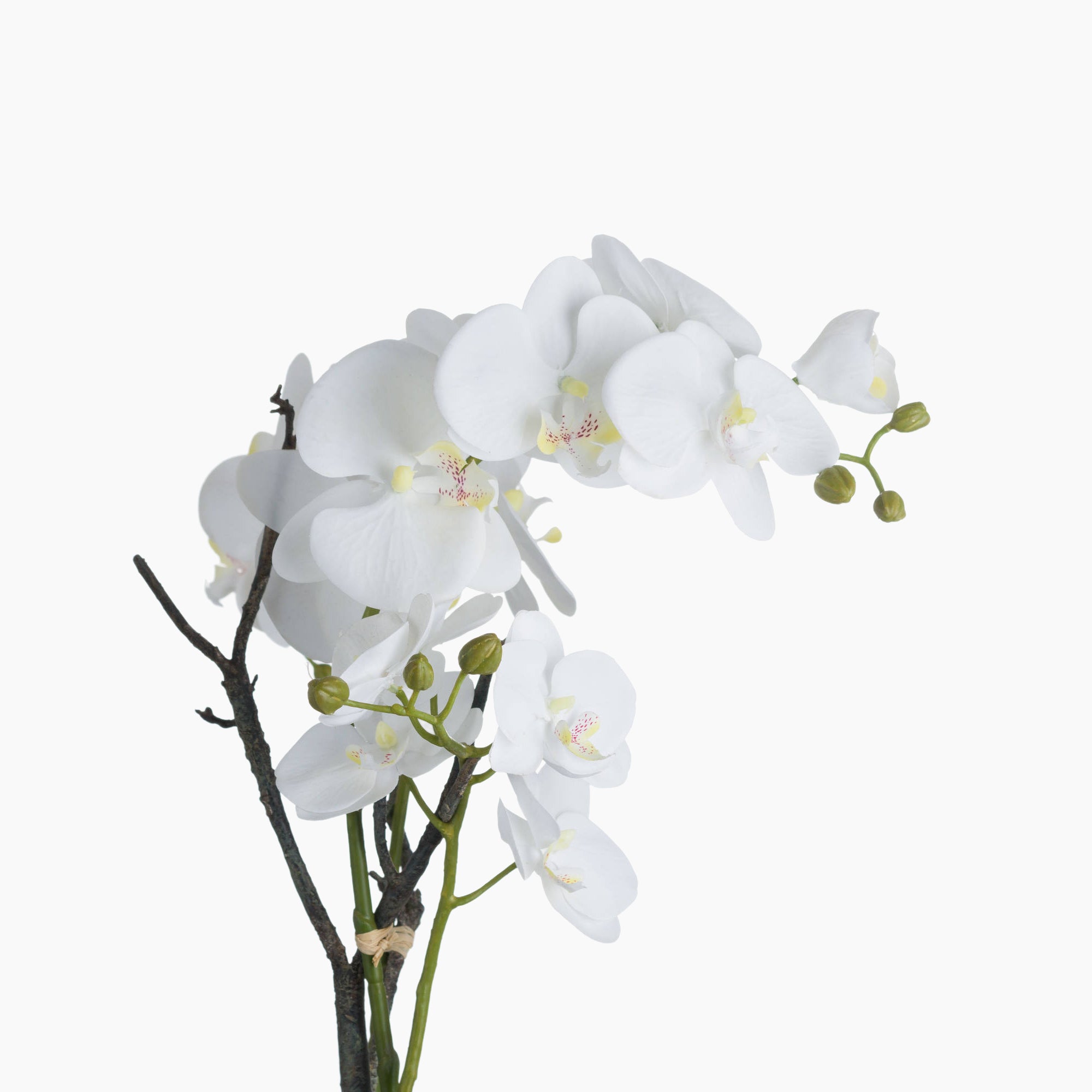 Angled view of artificial white orchid arrangement showing curved stem structure and aged stone pot detail