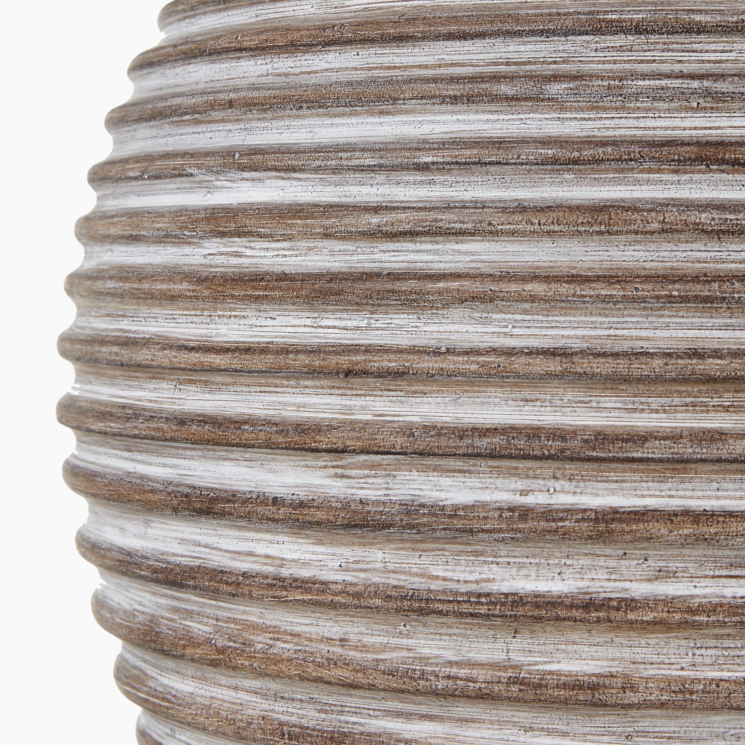 Close-up of ribbed stoneware base showing matte glaze and terracotta flecks
