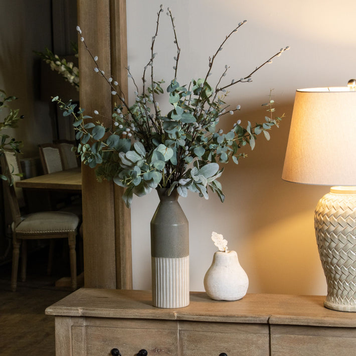 Whitford Glazed Ceramic Vase styled on a console table with natural light revealing its vertical ribbing and tonal glaze; placed as a sculptural interior accent.
