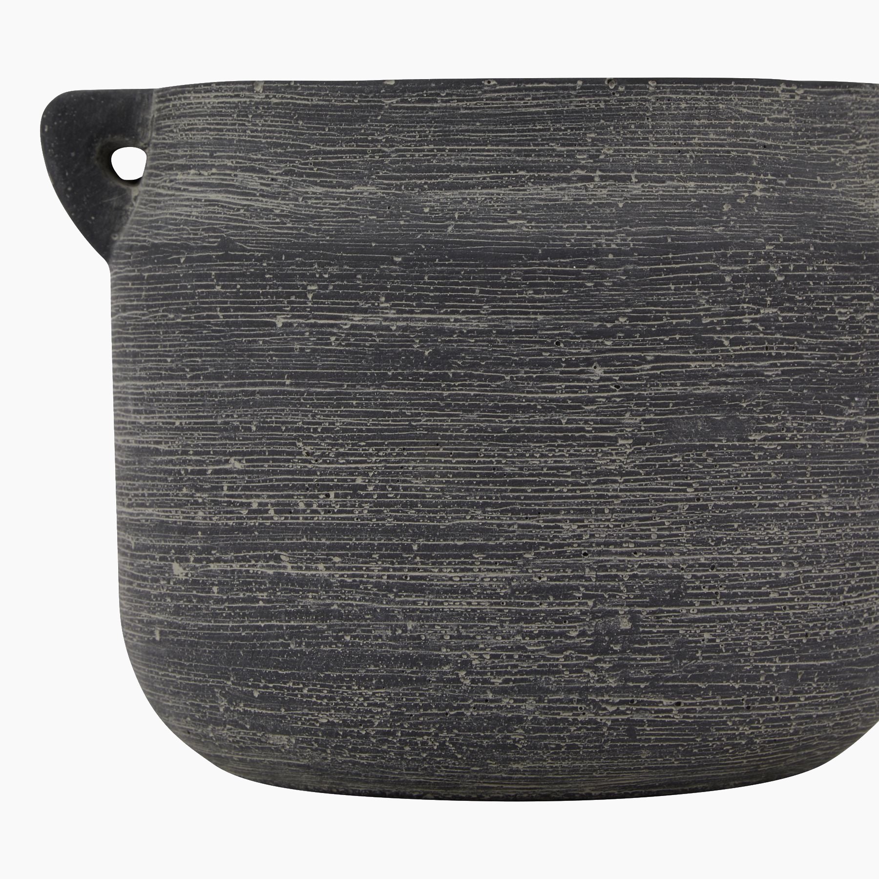 Close-up of Ashbury Slate Hydria Ceramic Planter’s weather-resistant matte finish, revealing fine horizontal striations and subtle kiln-fired variations.