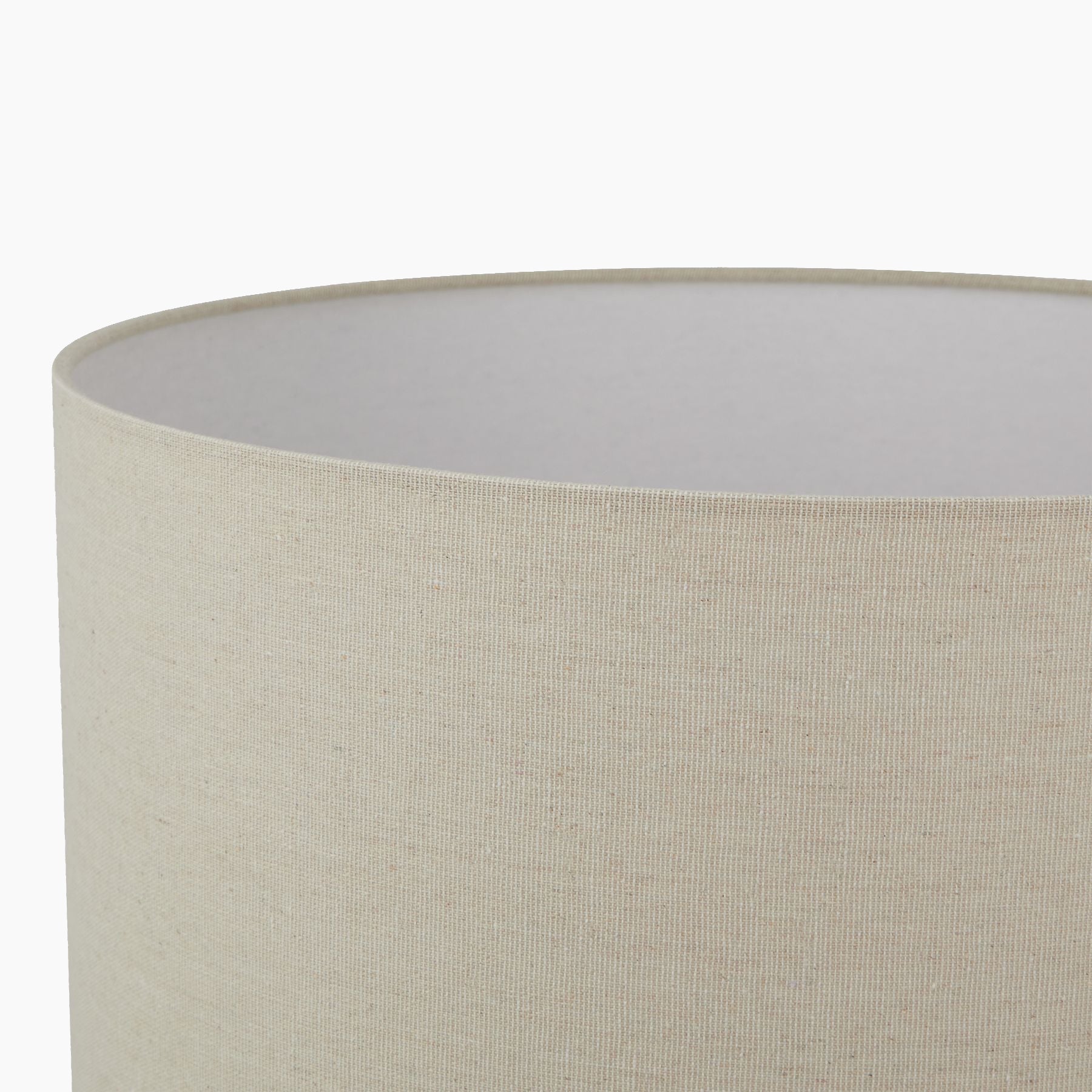 Close-up of antique-white fluted ceramic base showing matte texture
