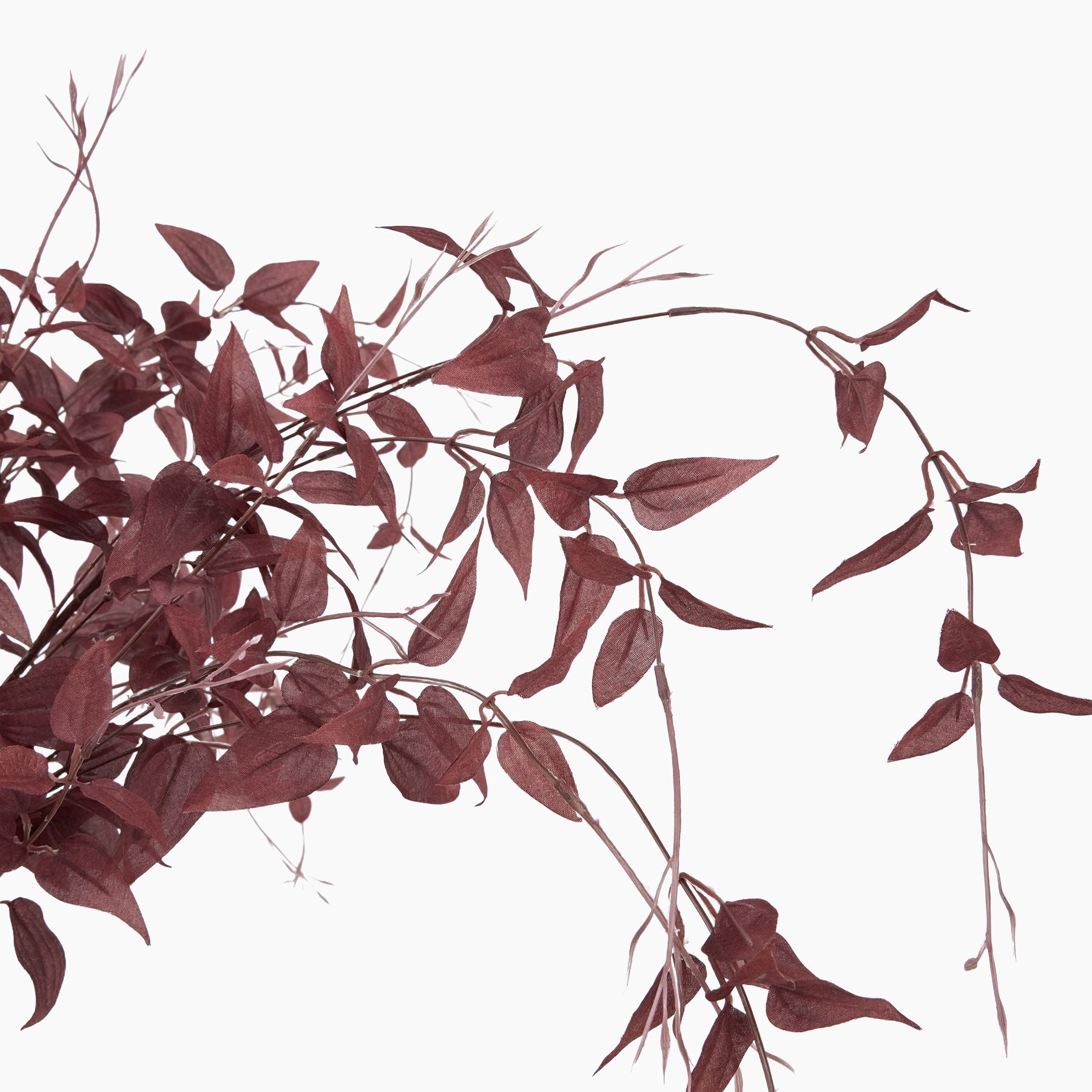 Stem detail of burgundy leaf faux branch, resin construction with layered artificial leaves in rich burgundy tones