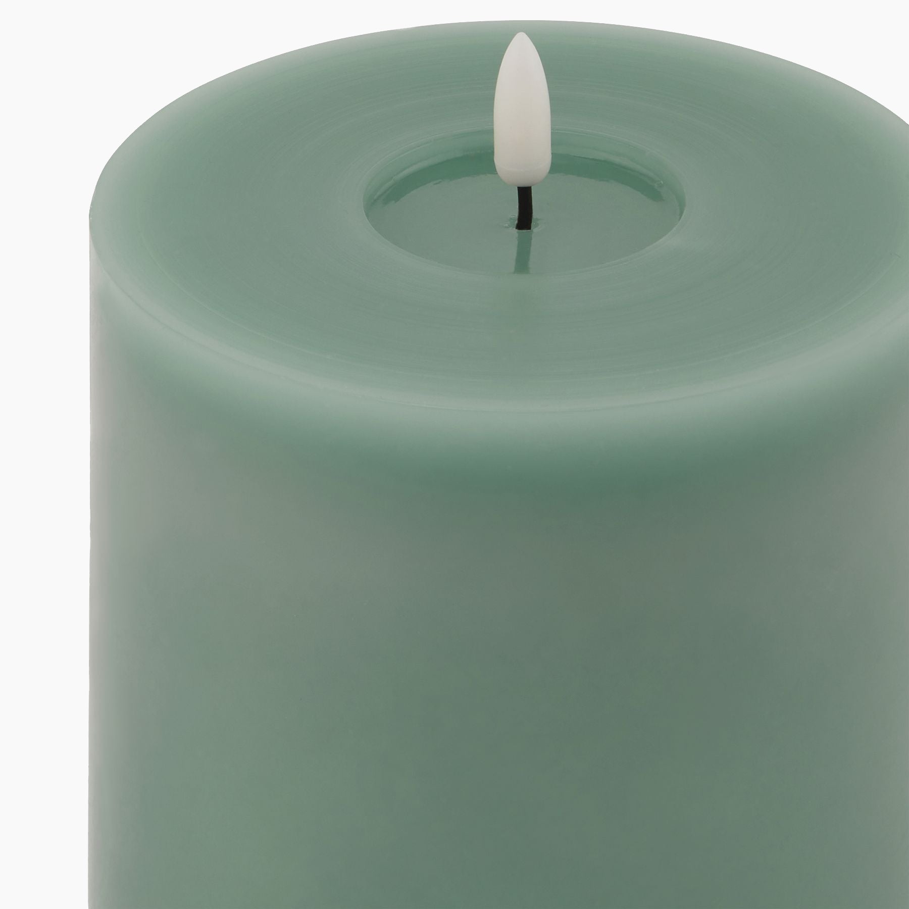 Sage green LED wax candle – 12.5cm wide melt-effect design with soft-glow light, sculptural modern shape for home styling