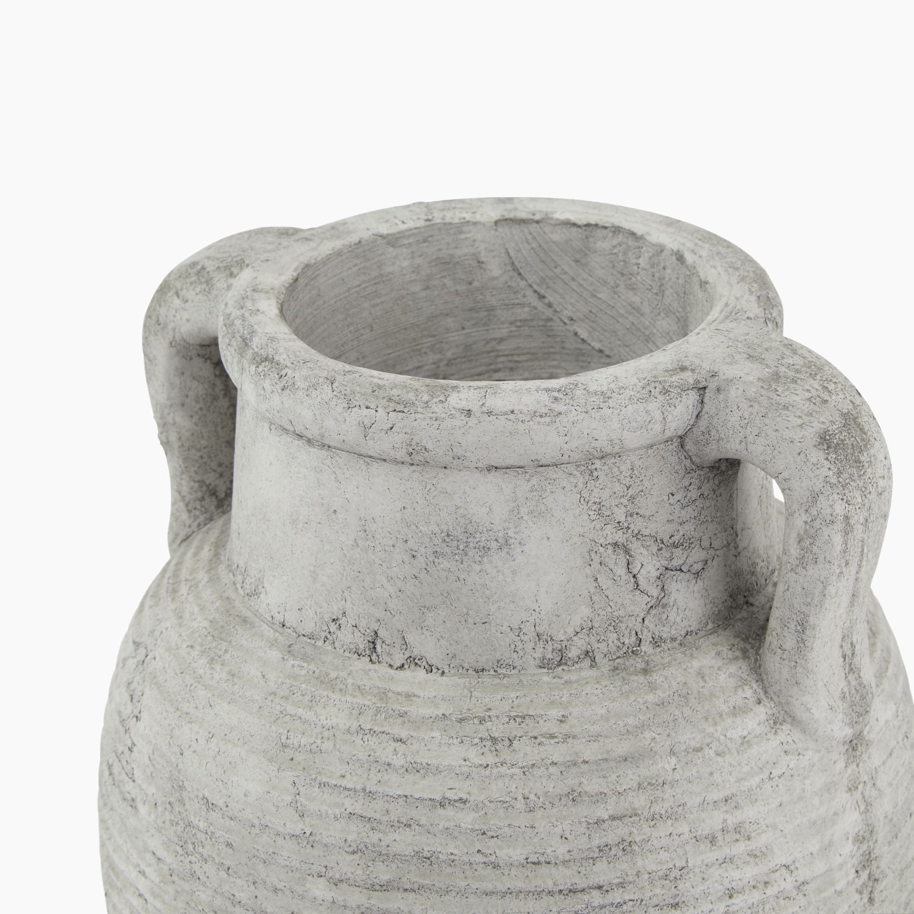 Angled view of ribbed stone-grey ceramic amphora vase with twin handles.