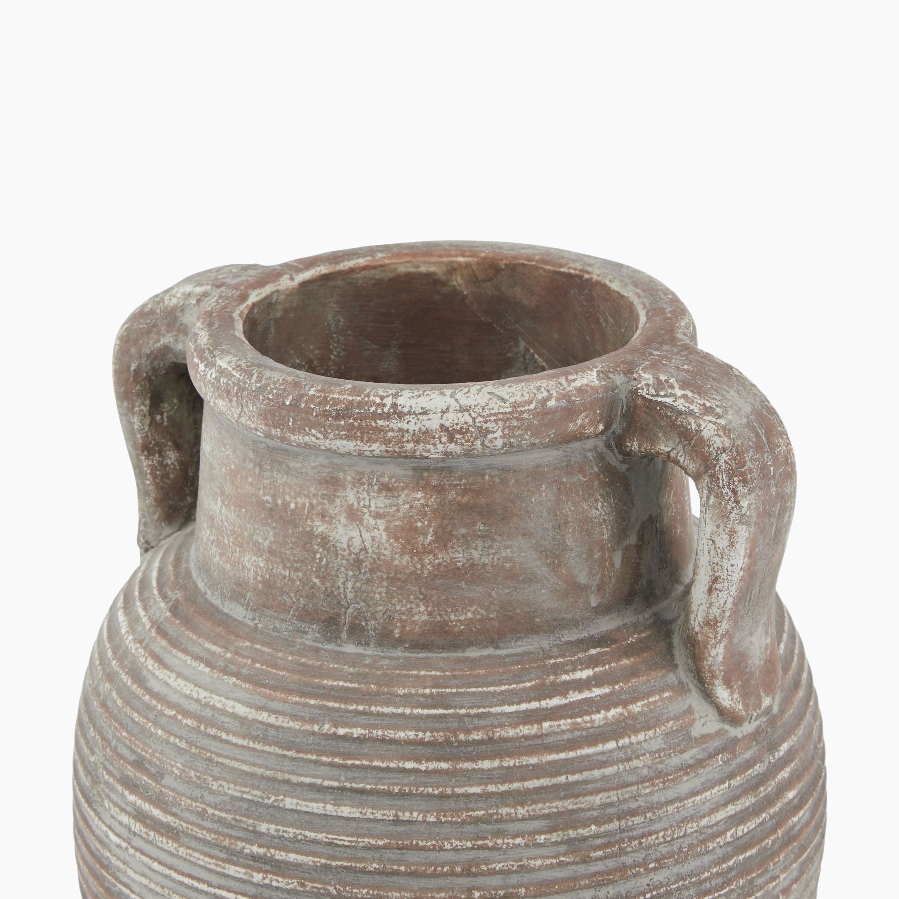 Angled view of the Lowther Amphora Vase highlighting its sculptural handles and weathered surface.