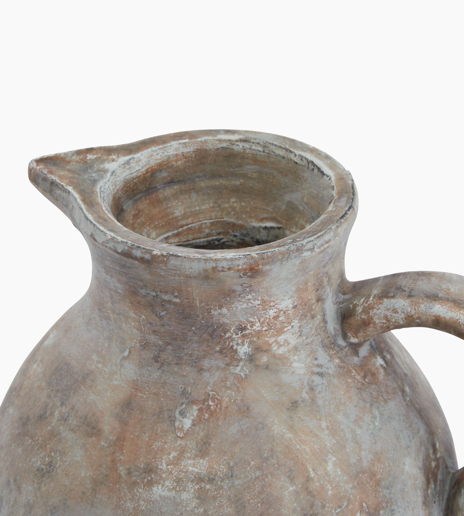 Angled view of the Lowther Brown Ceramic Jug showing curved spout and organic form with earthy brown layered glaze