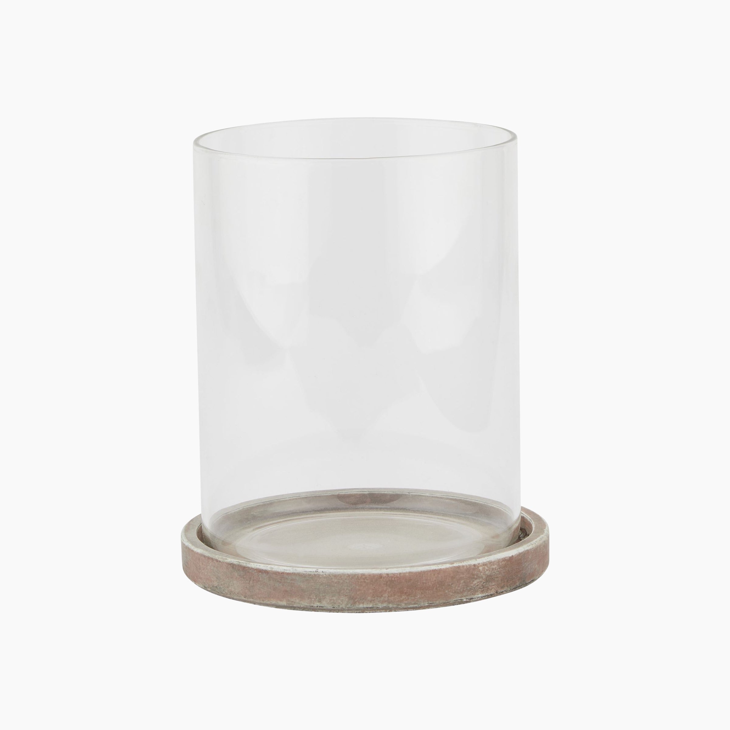 Front studio view of the Lowther Large Hurricane Lantern with clay brown stoneware base and clear glass shade.